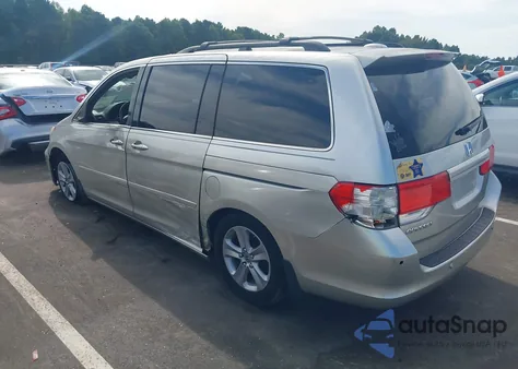 2009 Honda Odyssey Touring z USA, uszkodzony, nr VIN 5FNRL38989B011507